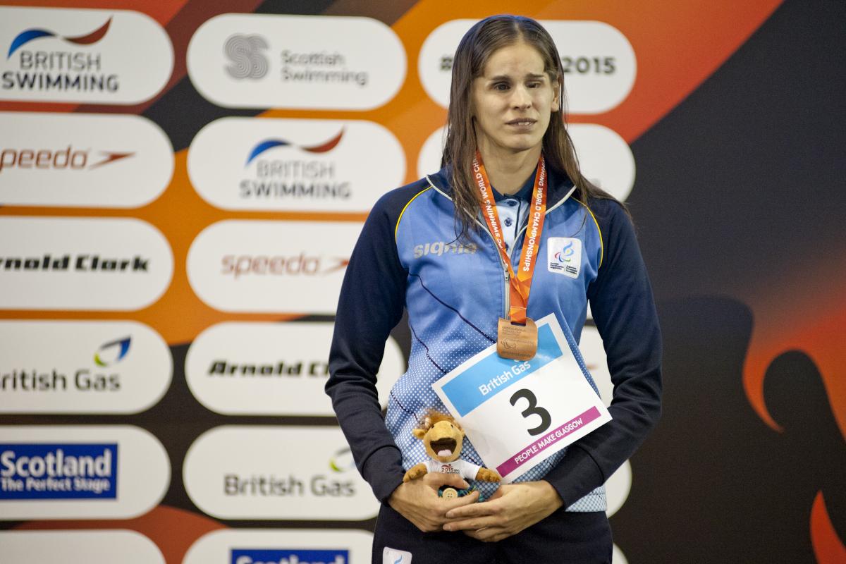Nadia Baez of Argentina on the podium after the Women's 100m Breaststroke SB11 at the 2015 IPC Swimming World Championships in Glasgow