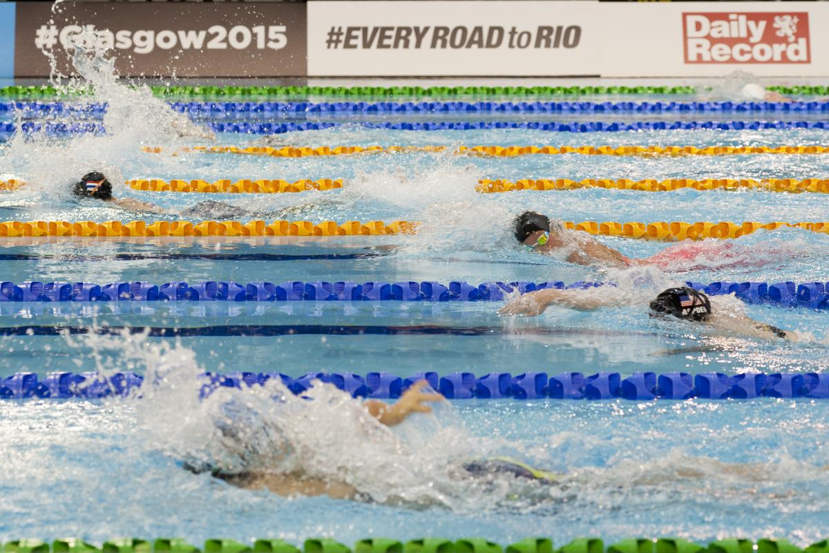 Athletes competing in the Women's 400m Freestyle S9 at the 2015 IPC Swimming World Championships in Glasgow.