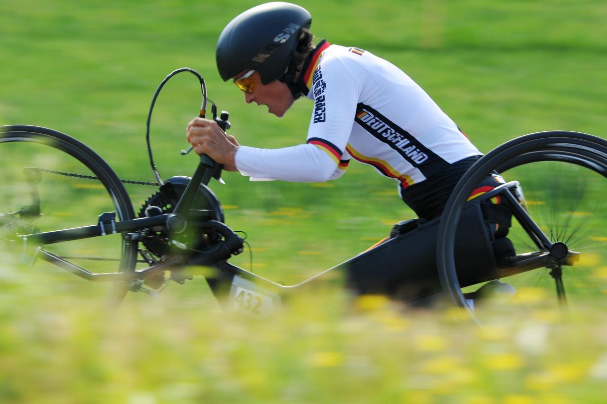 Women on handbike cycling 