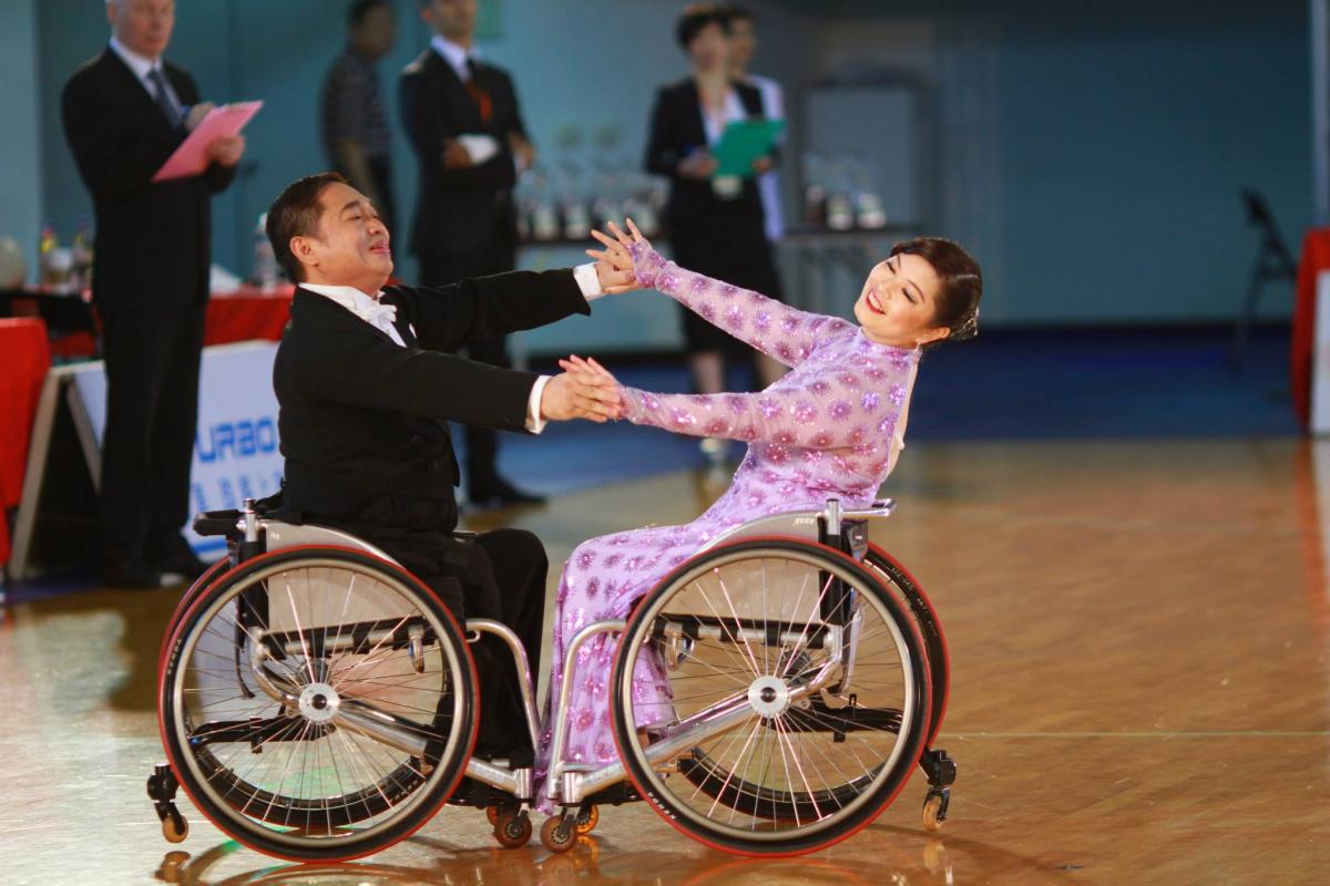 Wheelchair dancer partners competing in an event
