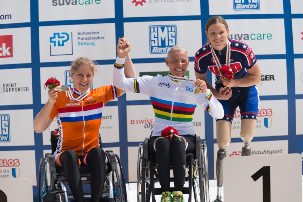 Three women on the podium