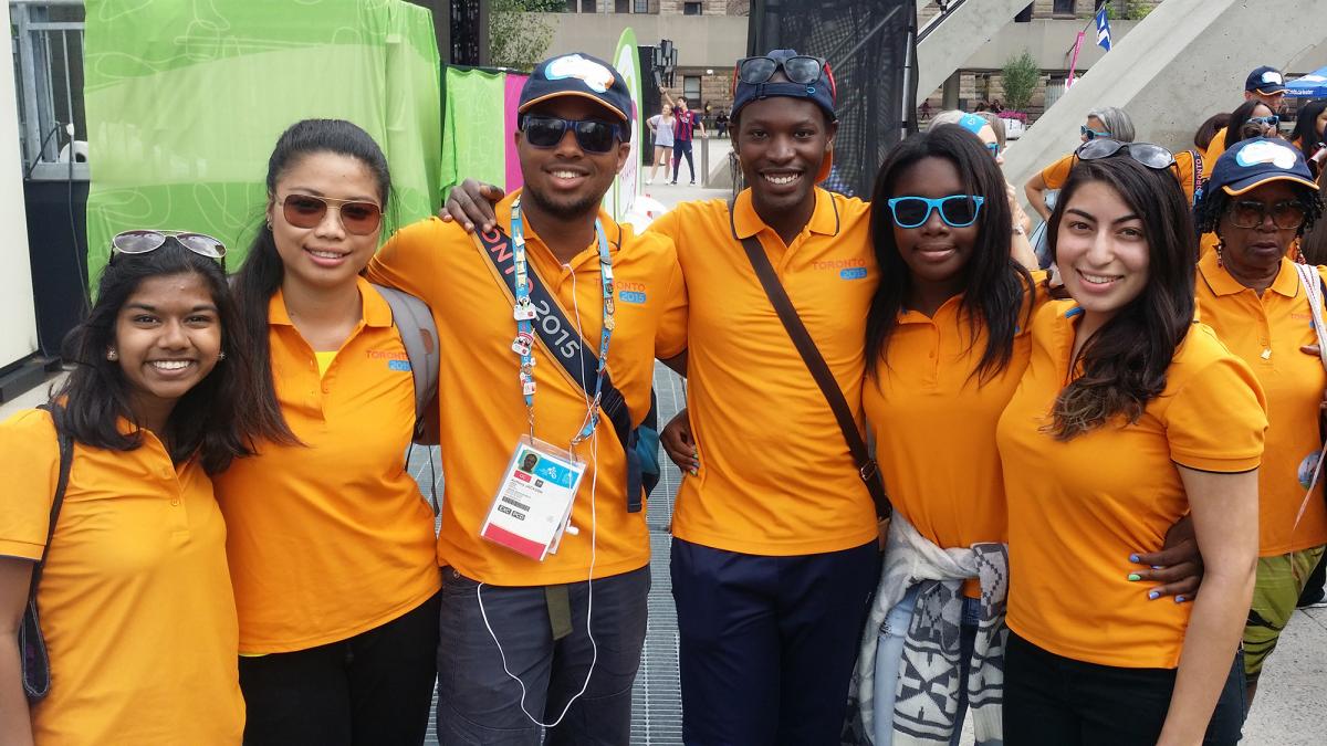 Toronto 2015 volunteers smile to the camera