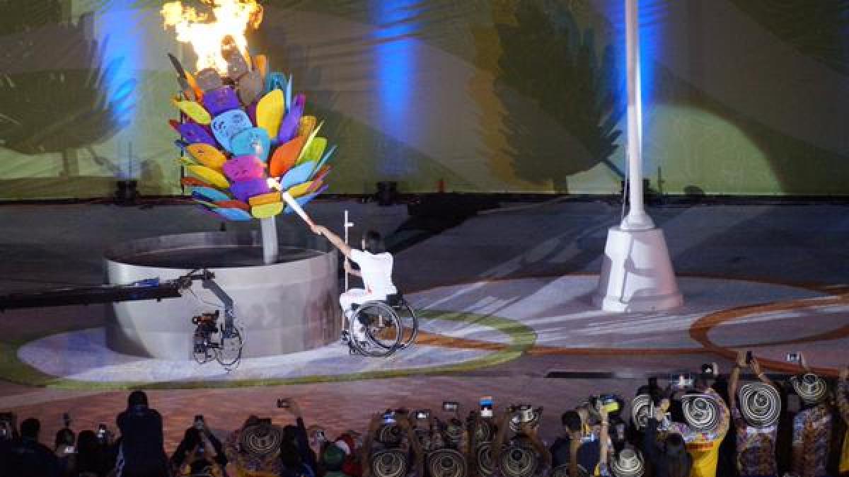 Canada's most successful ever athlete Chantal Petitclerc lights the Toronto 2015 Parapan Am cauldorn.