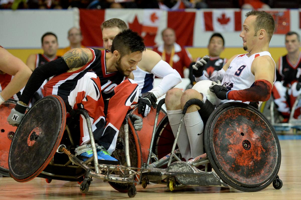 USA v Canada - Wheelchair Rugby - Toronto 2015 Parapan American Games Two wheelchair rugby players tackeling each other