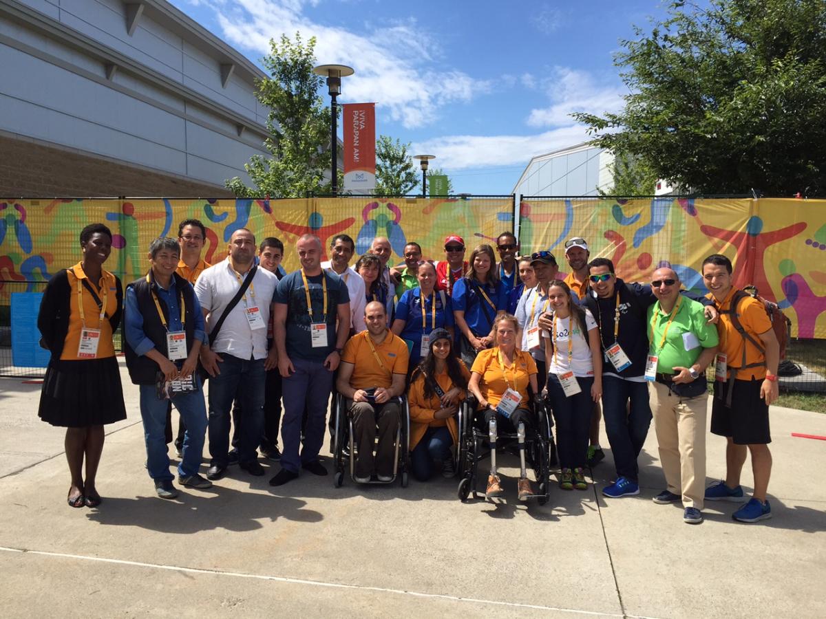 APC Toronto 2015 Observers’ Programme Group photo of people standing and in wheelchairs