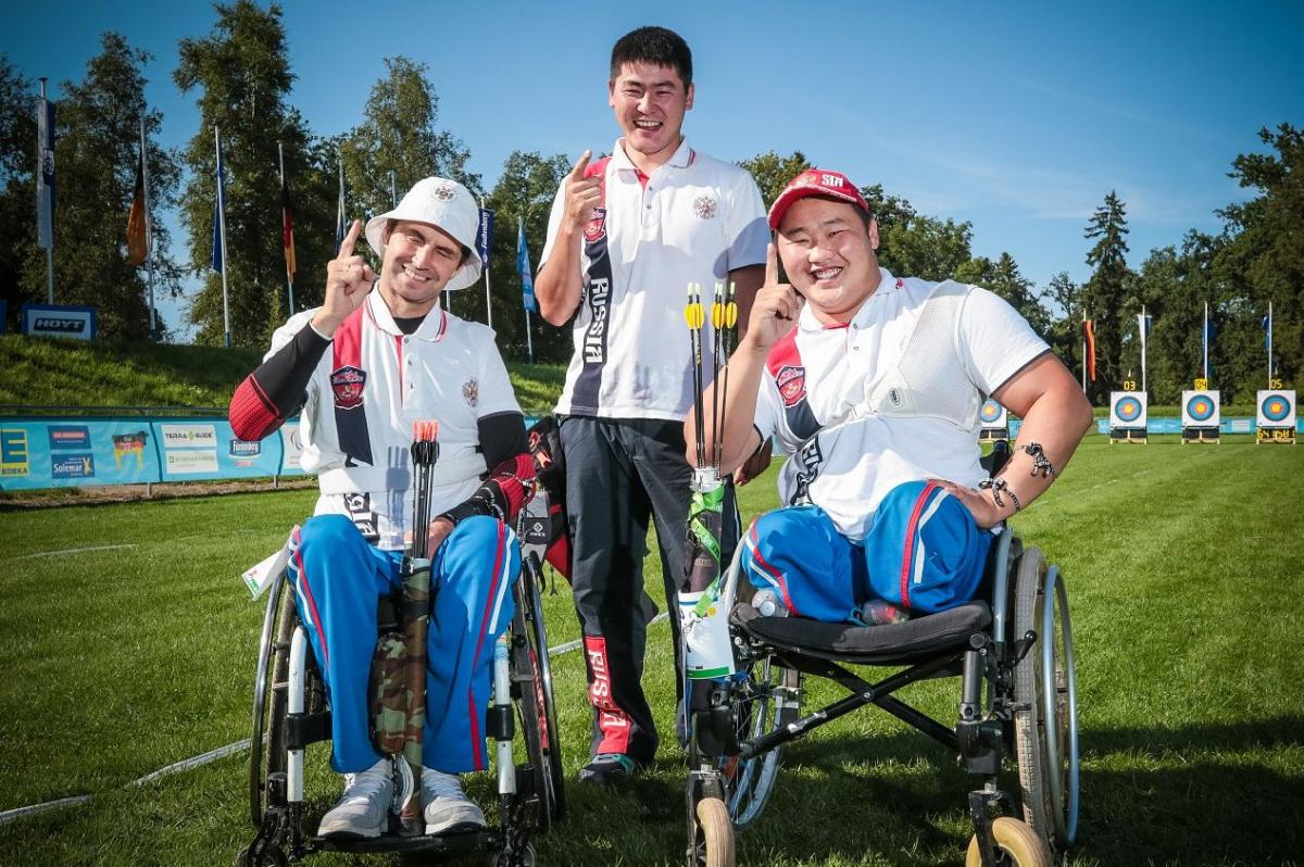 Russian recurve open team at World Archery Para Championships Three archers on the field of play