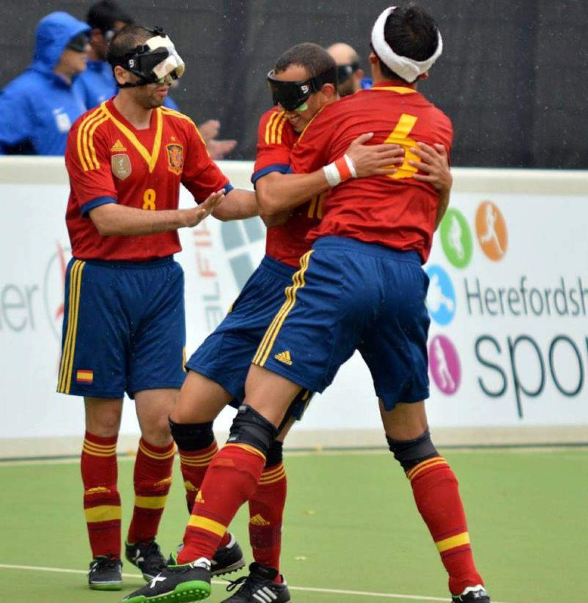 Spanish players celebrate a goal.