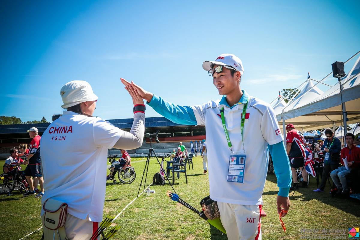 China archery - 2015 World Arhcery Para Championships in Donaueschingen, Germany Man and woman congradulate each other.