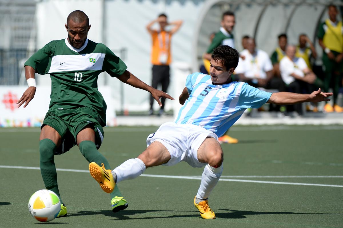 Brazil's Jan Brito Da Costa and Argentina's Matias Bassi - Football 7 Two men playing football
