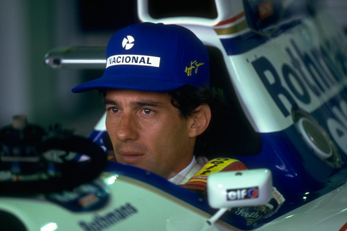 Ayrton Senna is a memorian ambassador of the Brazilian Paralympic Committee Face of a man sitting in a Formula 1 car.