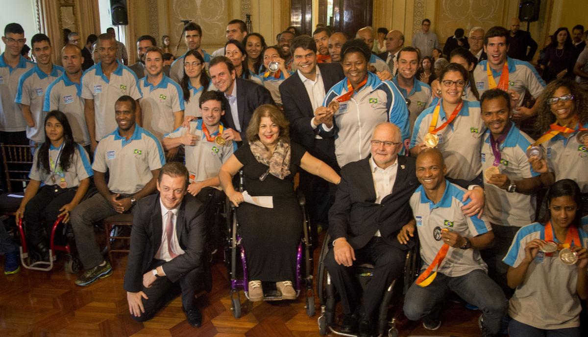 Team Rio athletes welcoming in Rio after Toronto 2015 Group shot of athletes in Brazilian team uniforms and some people in suits.