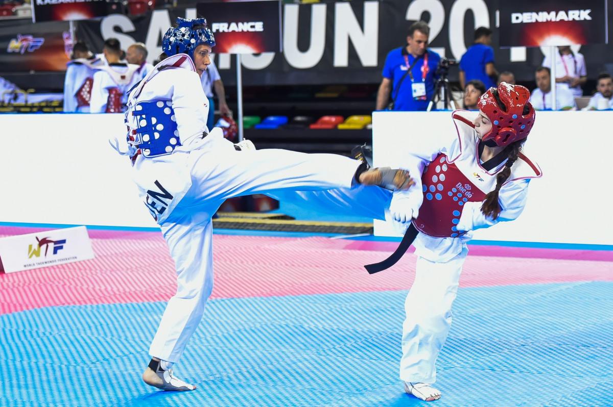 Two athletes doing taekwondo