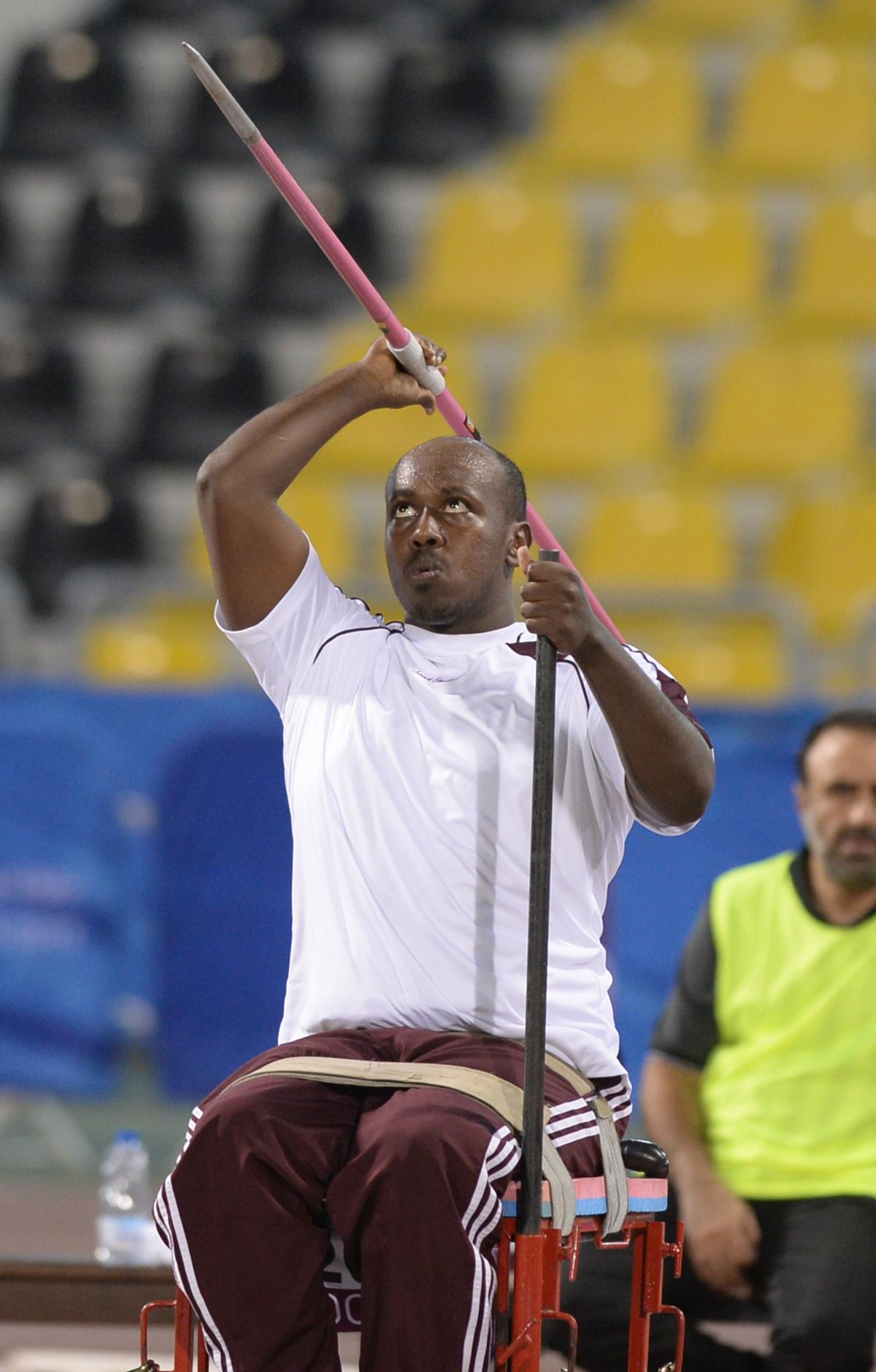 Abdelrahman Abdelqader - Qatar Man sitting, throwing a javelin