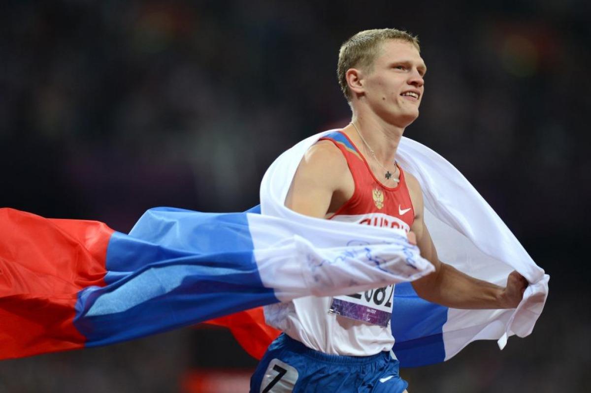 Evgenii Shvetcov of Russia celbrates winning gold in the Men's 100m - T36 Final at the London 2012 Paralympic Games.