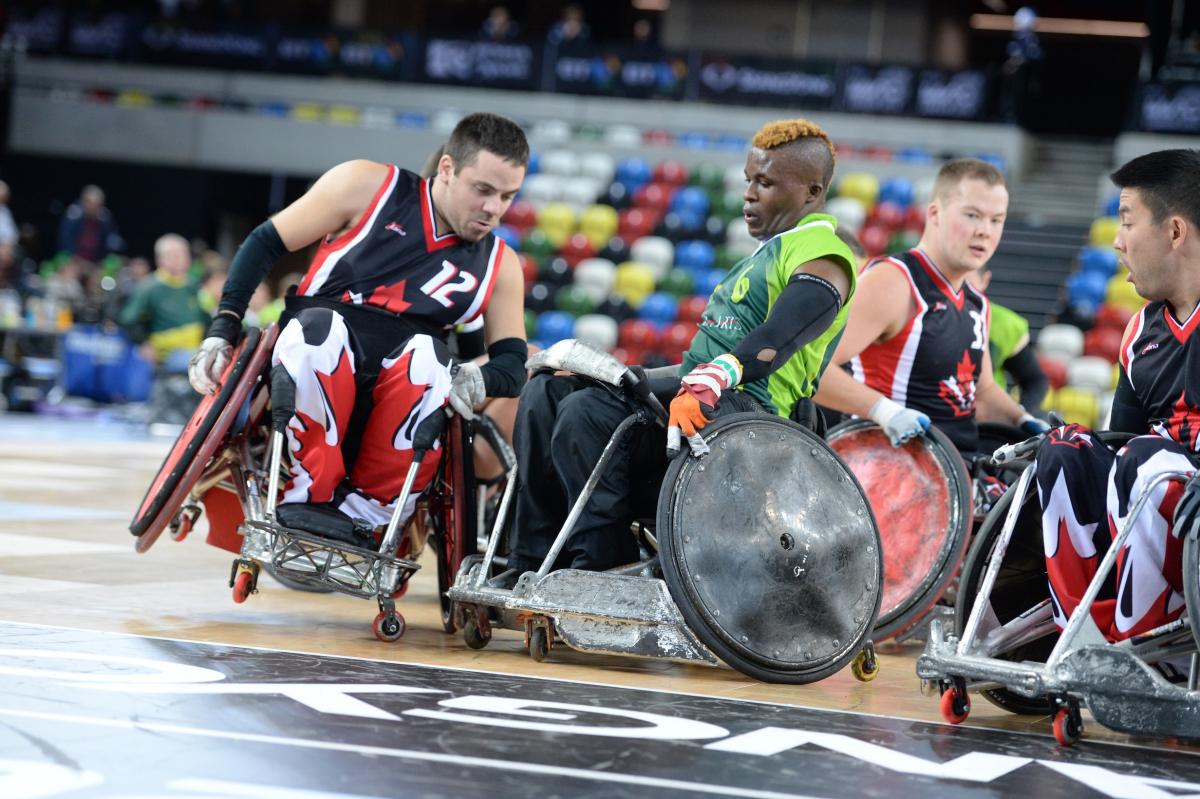 Wheelchair rugby players in action