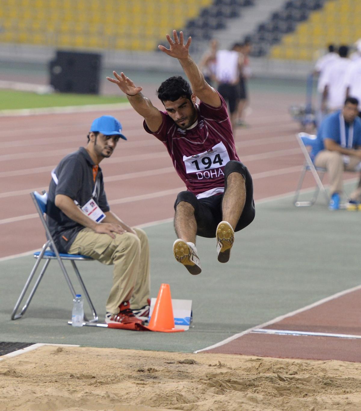 Man doing long jump