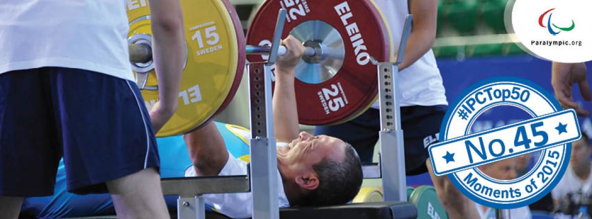 Top 50 Moments 2015: No. 45 Powerlifting raises the bar on development Powerlifter on a bench, raising a bar