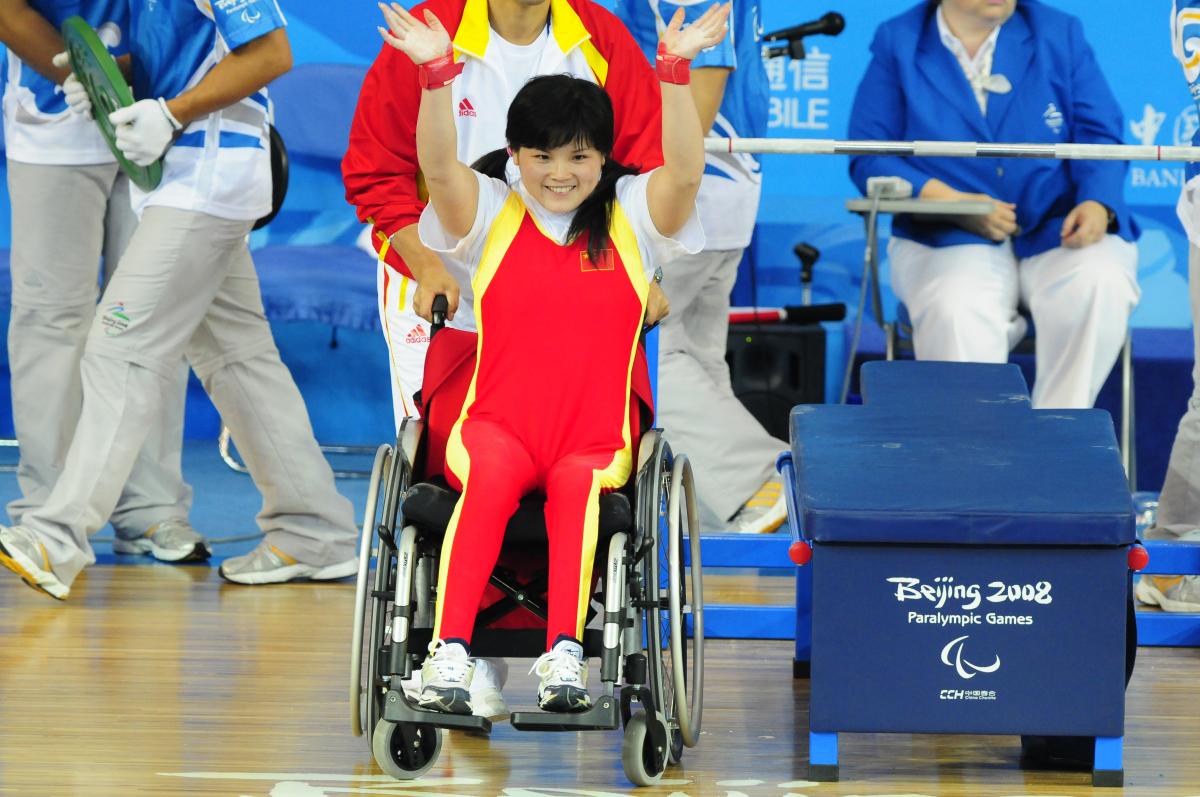 Cuijuan Xiao Beijing 2008 A Chinese powerlifter celebrates winning gold in powerlifting at her home Paralympic Games.