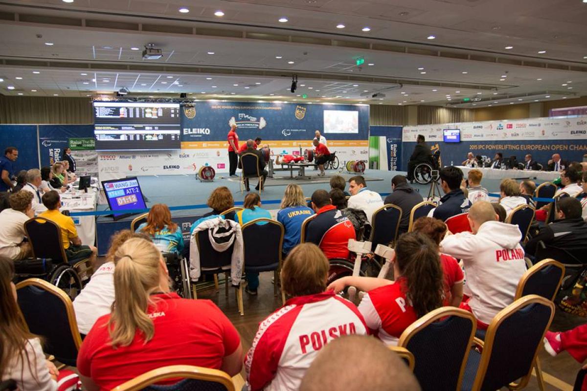 The crowd watches on as a powerlifter attempt a lift