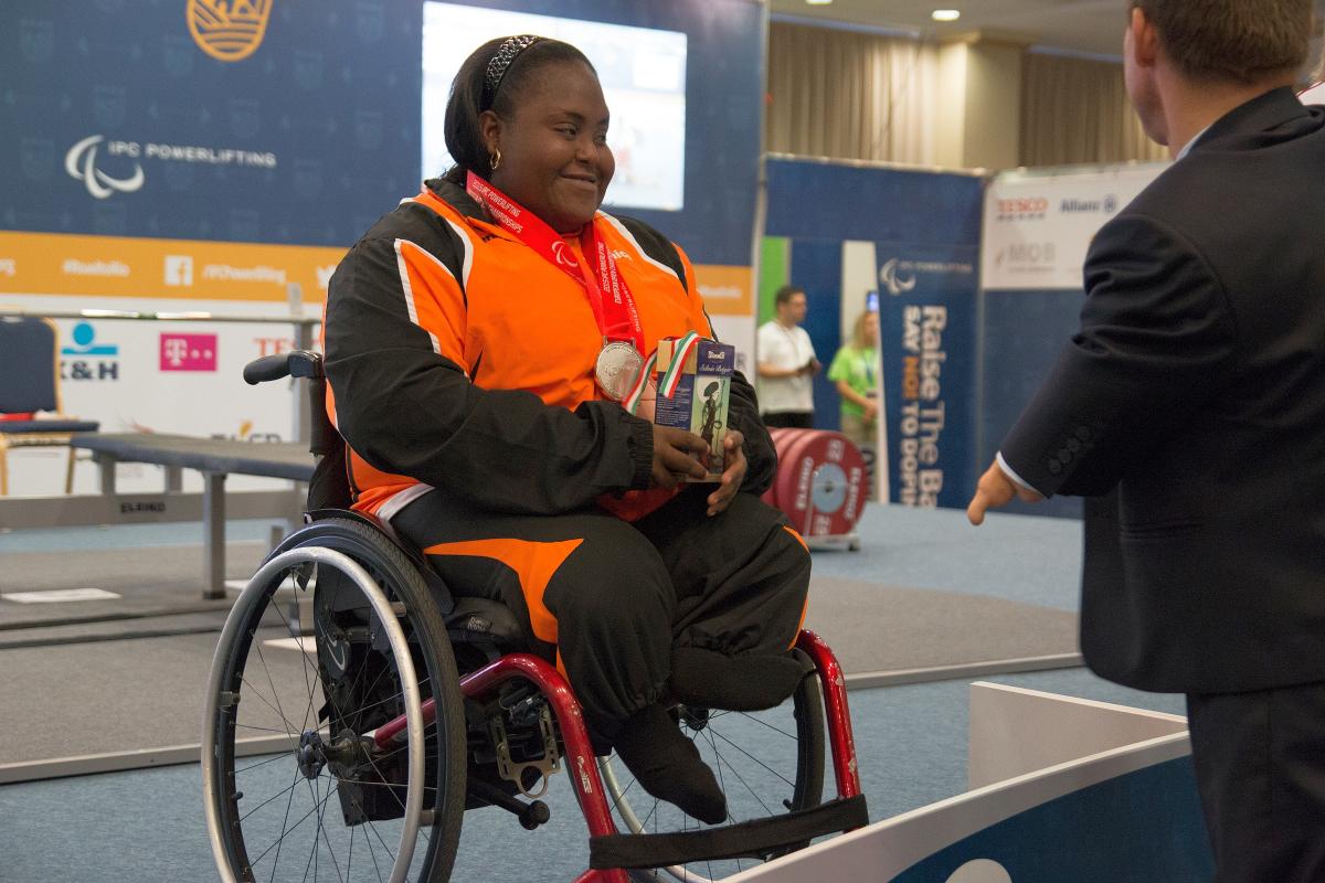 Melaica Tuinfort - 2015 IPC Powerlifting European Open Championships Woman in wheelchar with medal around her neck