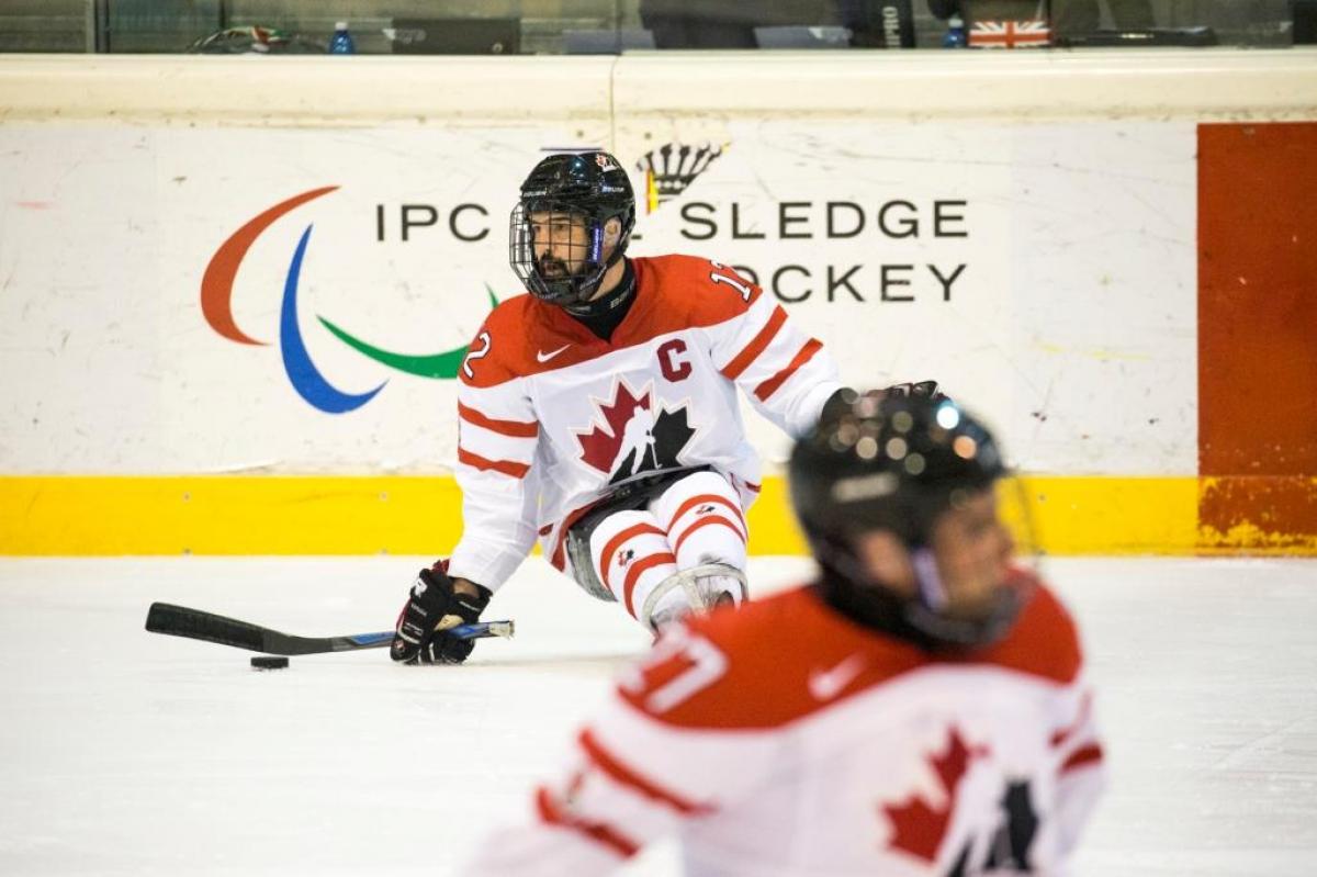 Canada took the lead at the top of the Torino 2015 ice sledge hockey international tournament table.