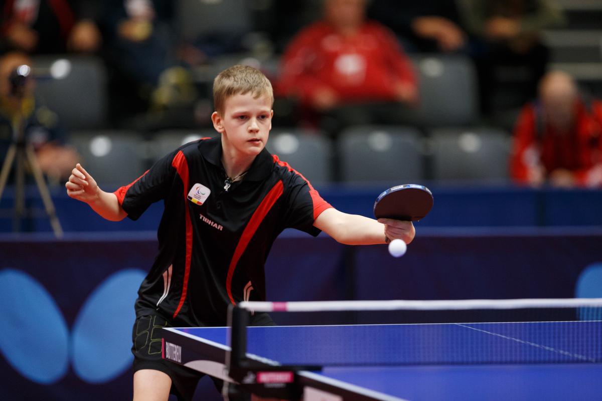 Man plays table tennis