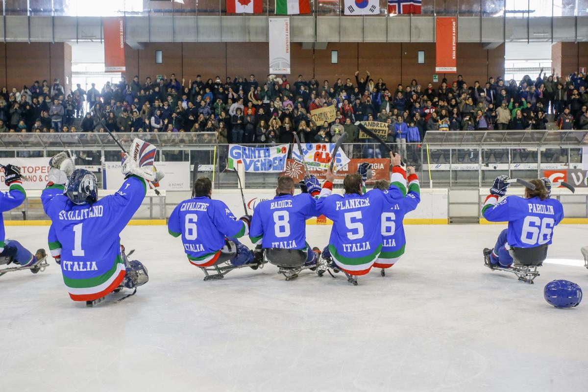 Italy v South Korea ice sledge hockey international tournament 2015 Italian ice sledge hockey players thank their supporters after making it to the final of the international tournament in 2015