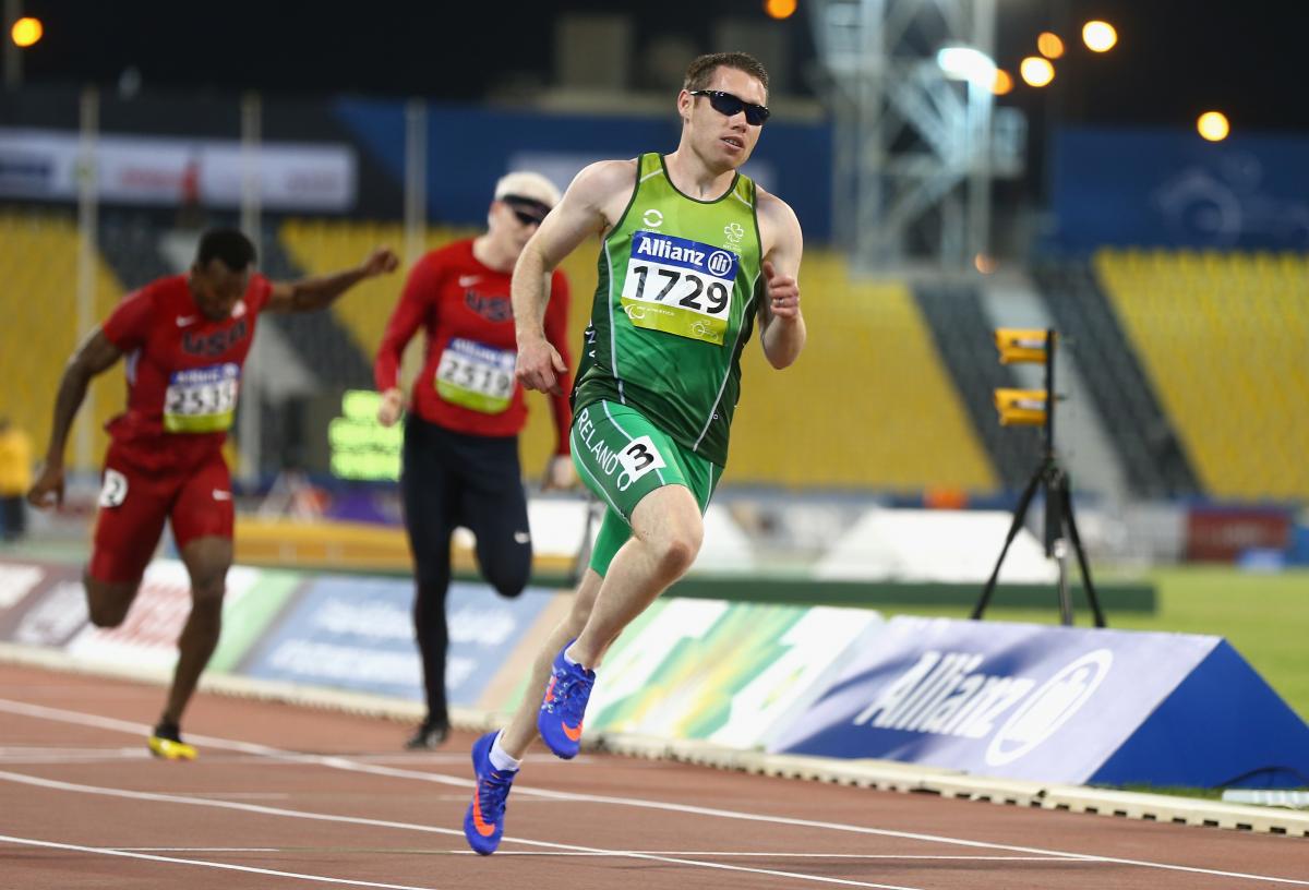 a male competing for Ireland wearing green clothes