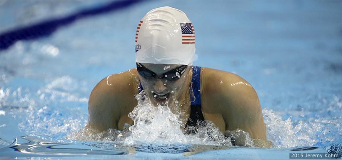 A female swimmer doing breaststroke