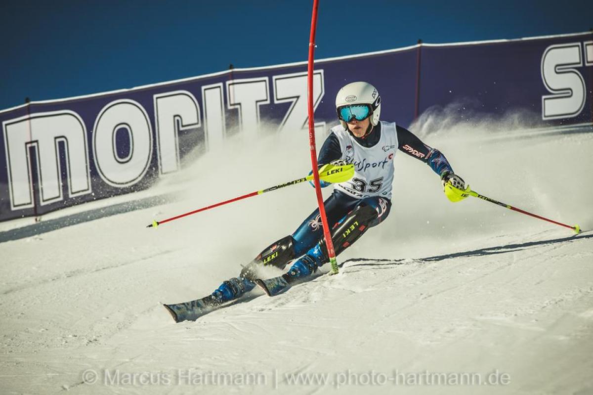 Men's standing skier Thomas Walsh of the USA tackles a gate during slalom