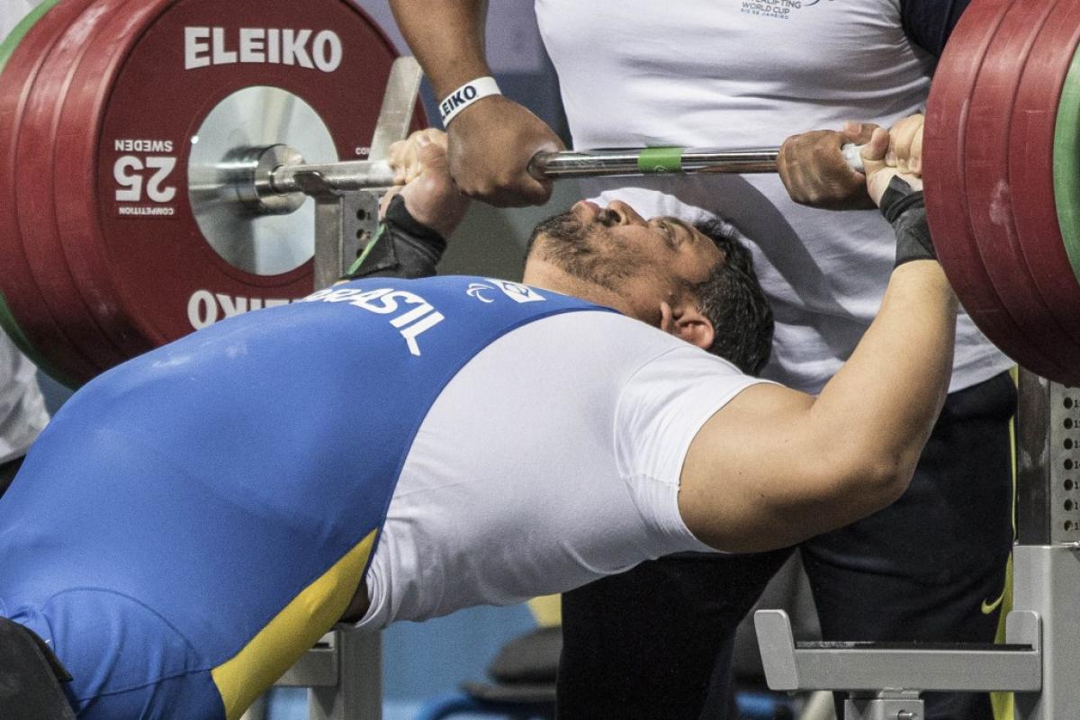 A powerlifter prepares to take the strain