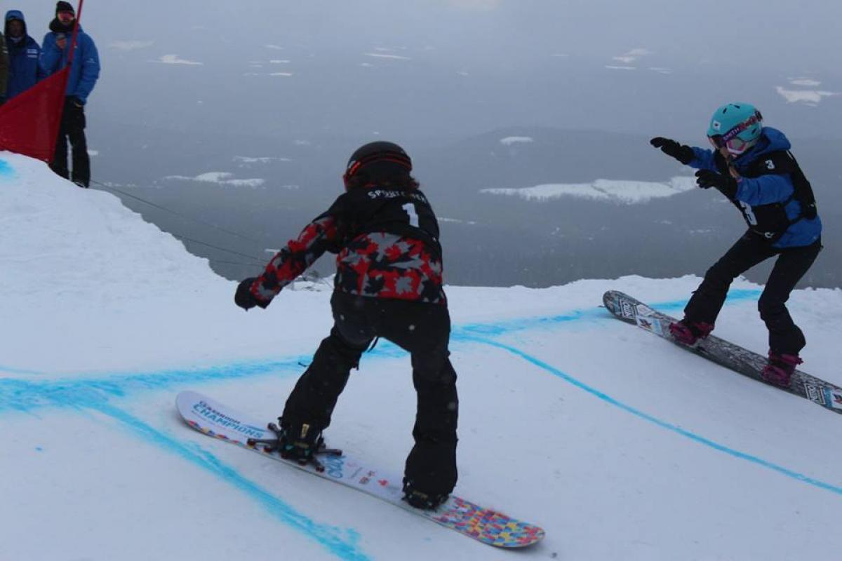 Two snowboarders on the slope