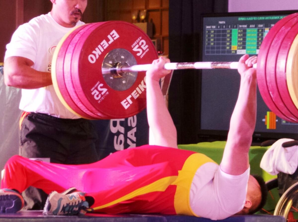 Man on a bench lifting