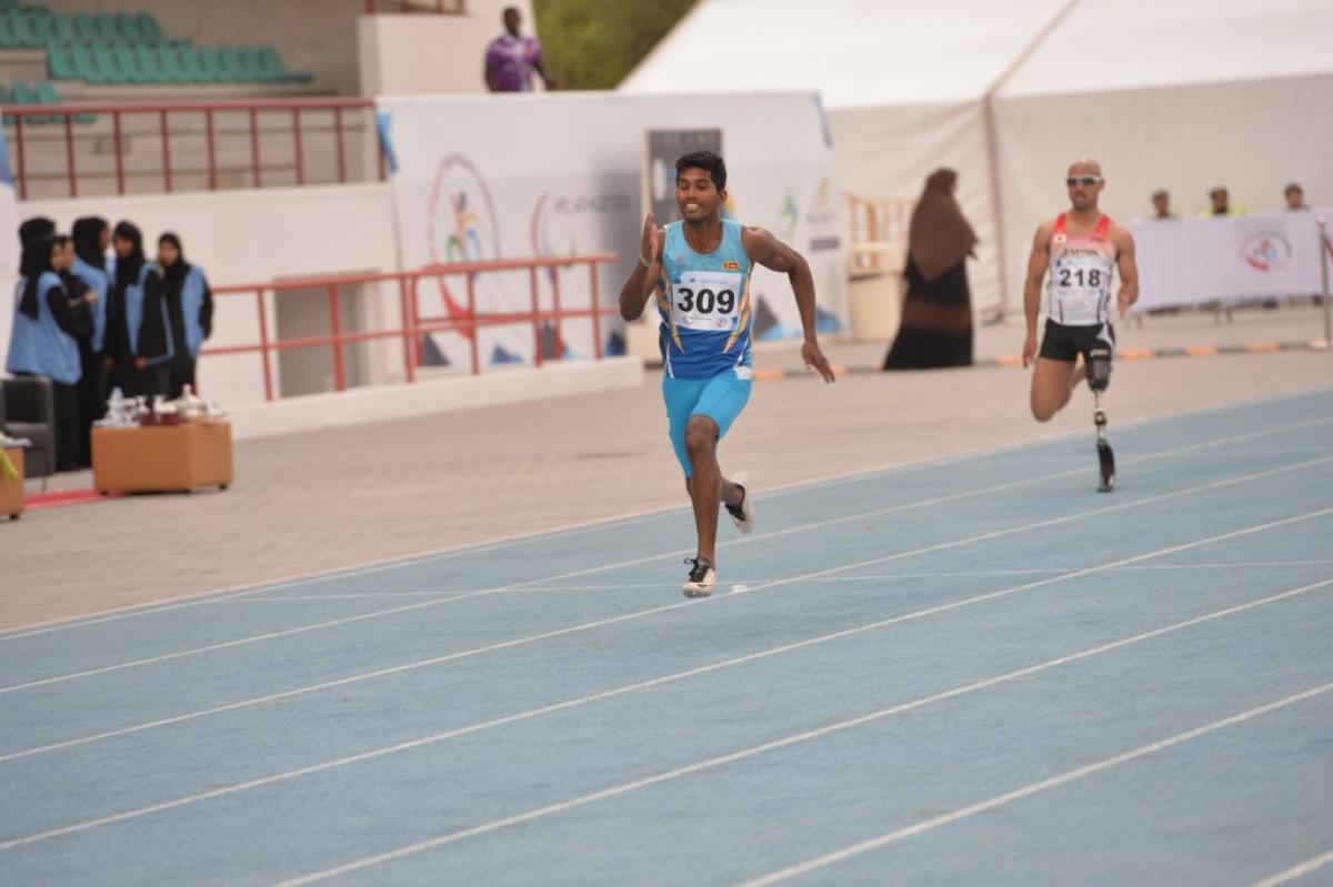 Anil Prasanna Jayalath Yodha Pedige - Sri Lanka - Dubai 2016 Man running on a blue track