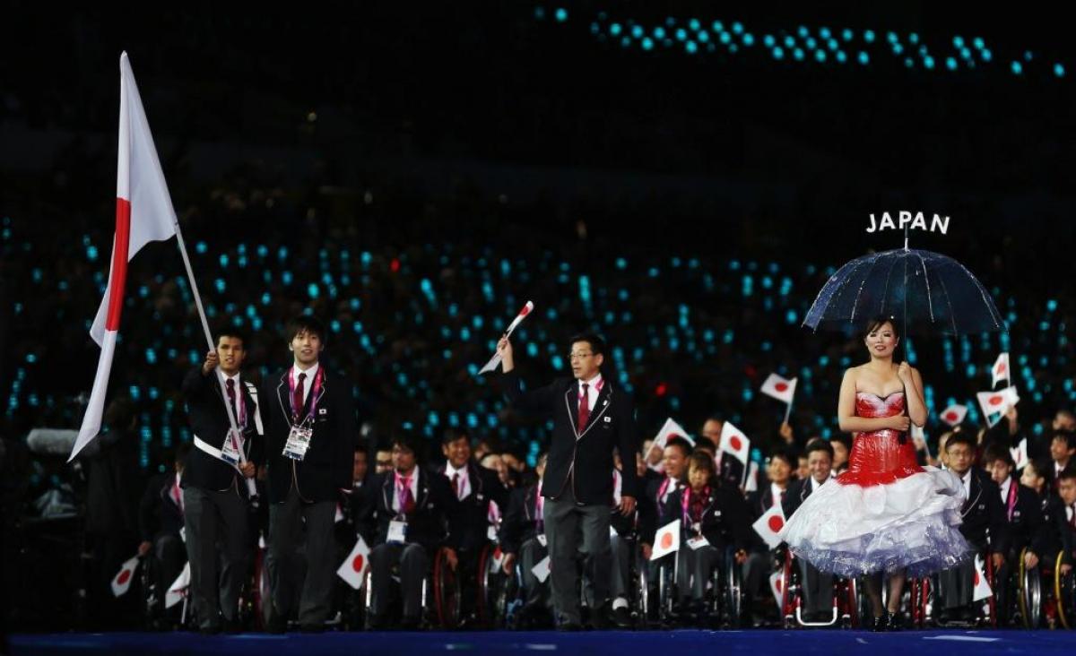 Swimmer Keiichi Kimura of Japan carries the flag during the Opening Ceremony of the London 2012 Paralympic Games.
