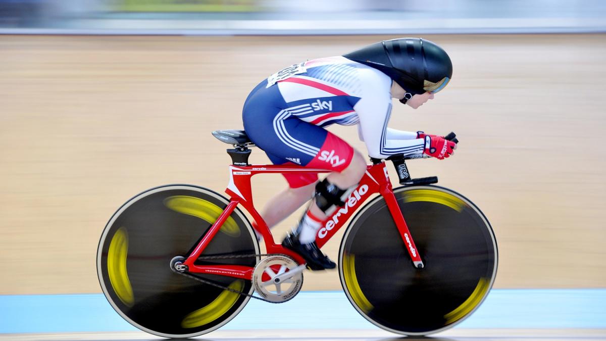 A para-cyclist competes on the track
