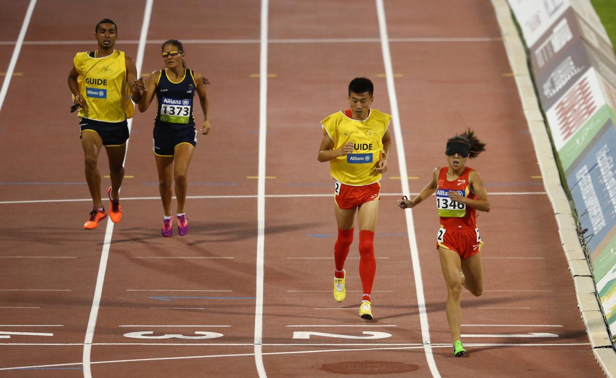 China's Jin Zheng celebrates winning the women's 1500m T11 final during the 2015 IPC Athletics World Championships.