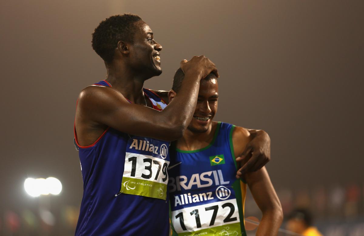Brazil's Daniel Martins celebrates winning the men's 400m T20 final with Graclino Tavares Barbosa of Cape Verde during the 2015 IPC Athletics World Championships.