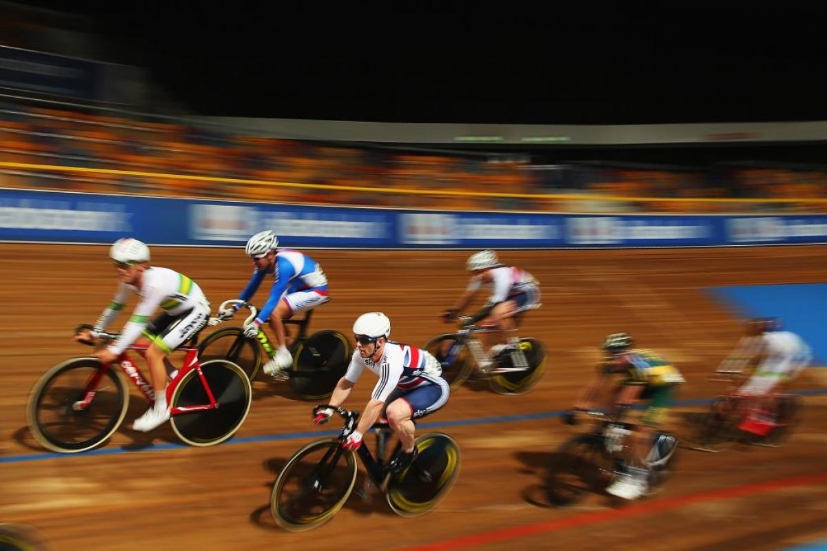A group of cyclists compete in the Men's C4-5 Scratch race at the UCI Para-cycling Track World Championships in Apeldoorn, Netherlands.