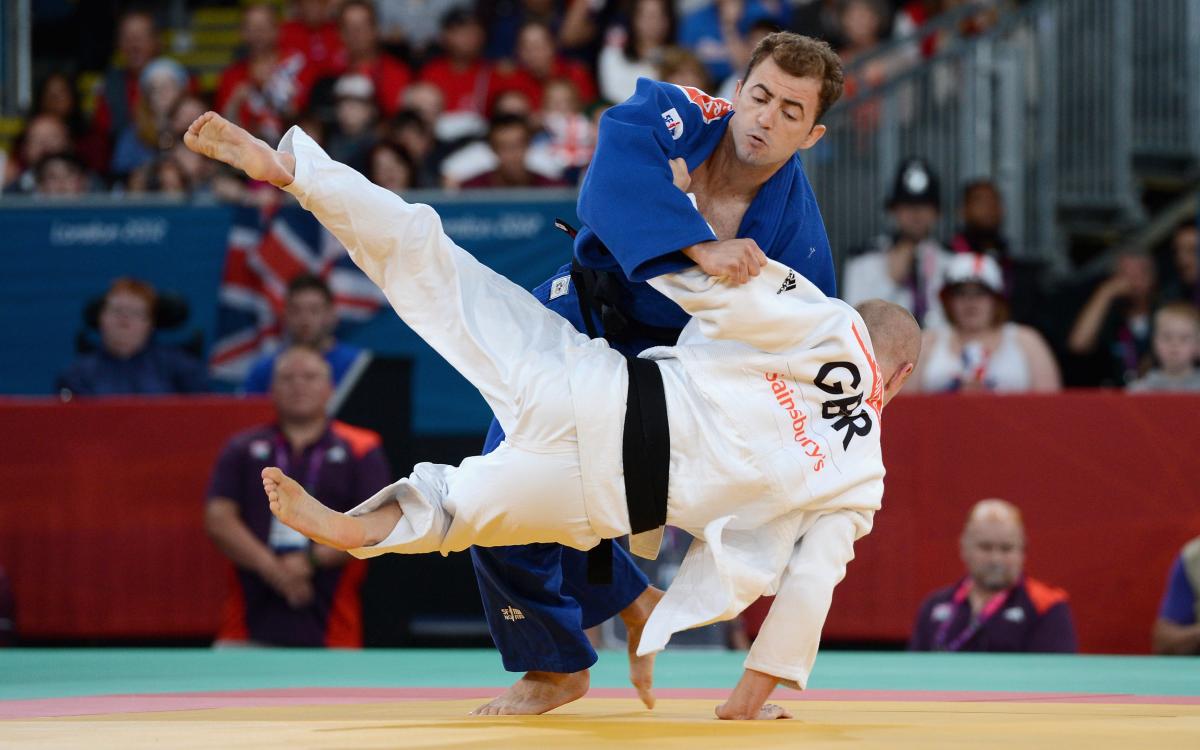 Noura Mouloud, Algeria - Judo - London 2012 Paralympic Games Two judo athletes fighting on a tatami or judo mat.
