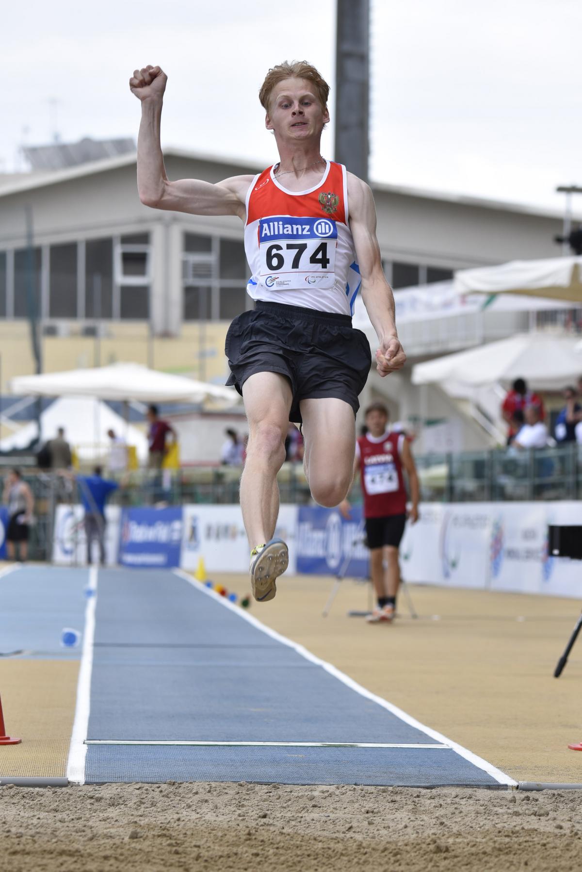 Man in the air during a lung jump