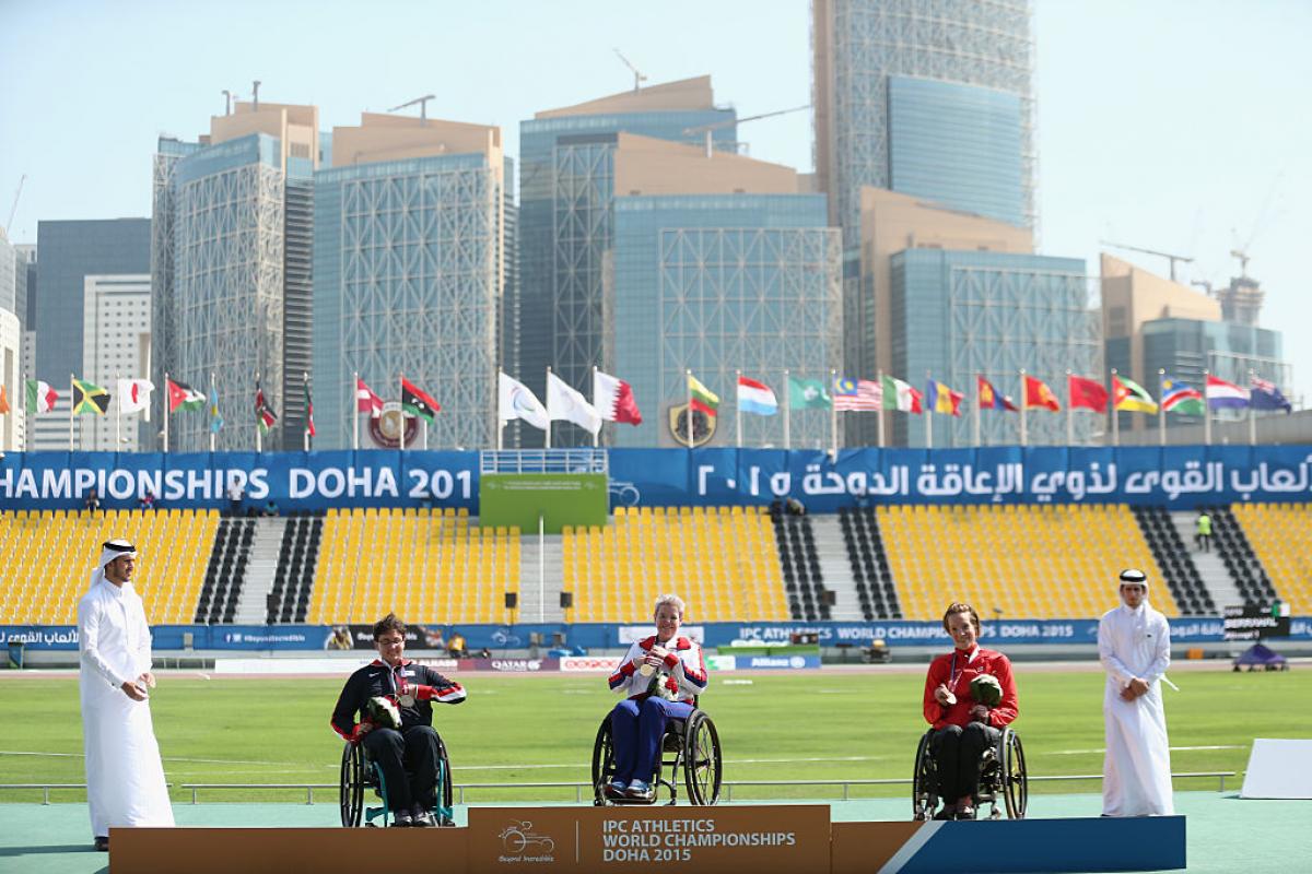 Jo Butterfield - Great Britain - club throw - Doha 2015 Podium with three women in wheelchairs