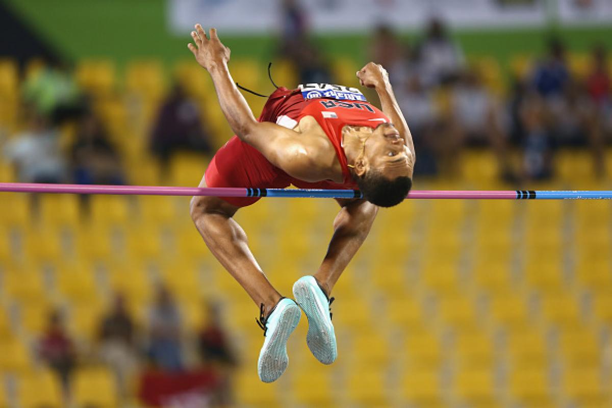 Man doing high jump