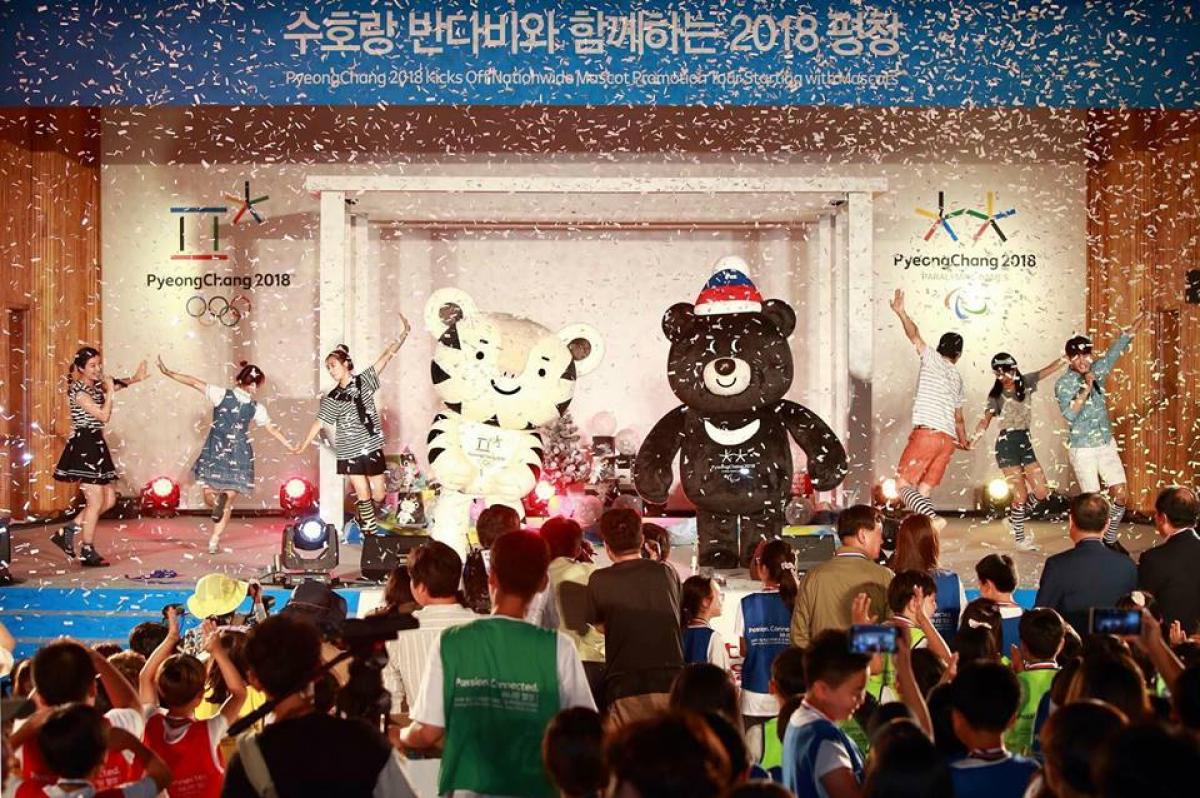PyeongChang 2018 kicks off mascot promotion tour The PyeongChang 2018 full-sized mascots appear on stage in front of a crowd.