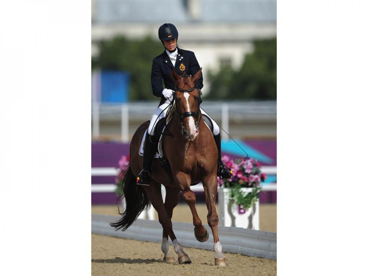 Michele George of Belgium Michele George of Belgium rides Rainman to win Gold during the Equestrian Dressage Individual Freestyle Test - Grade IV at the London 2012 Paralympic Games.