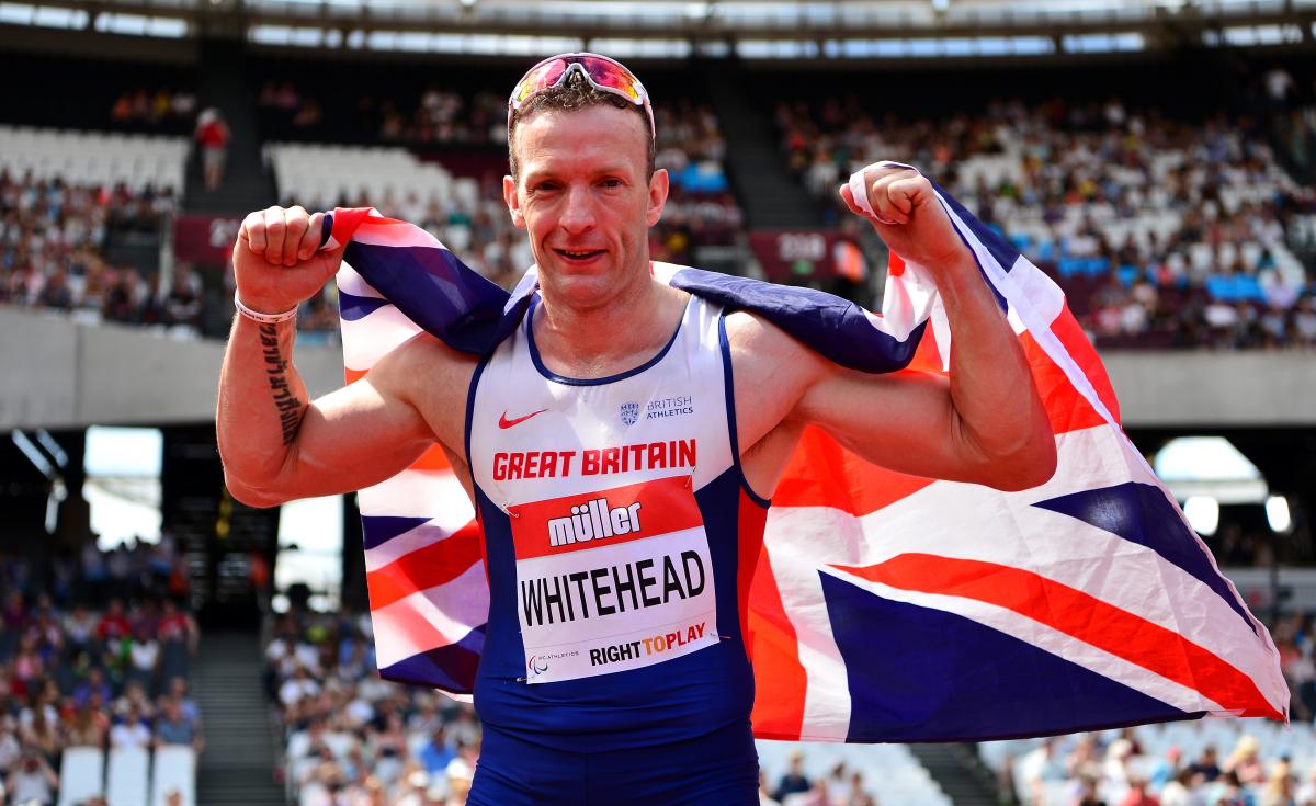 Great Britain's Richard Whitehead celebrates after setting a new world record in the men's 200m T42 at the 2016 IPC Athletics Grand Prix Final at The Stadium - Queen Elizabeth Olympic Park.