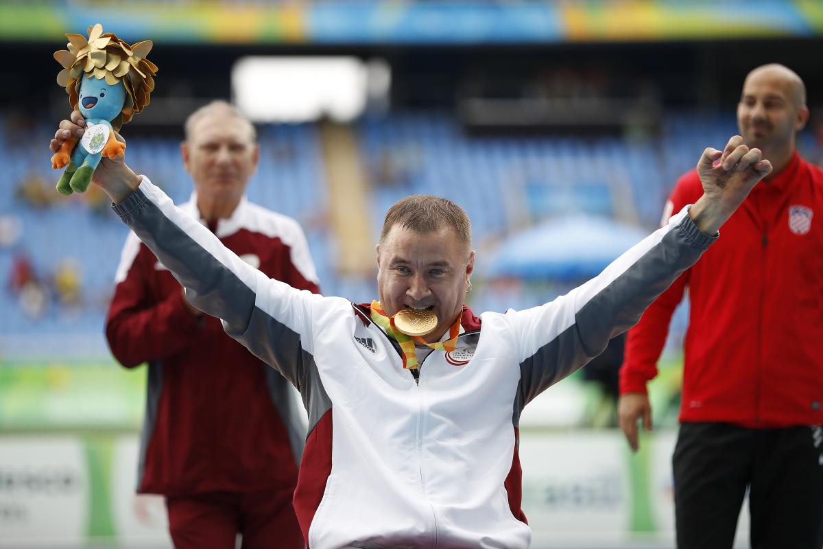 Latvia's Aigars Apinis celebrates Rio 2016 discus F52 gold.