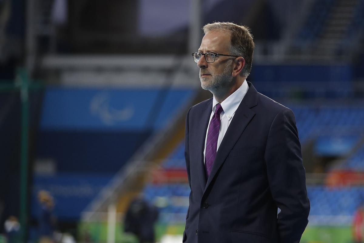 A man stands in a stadium