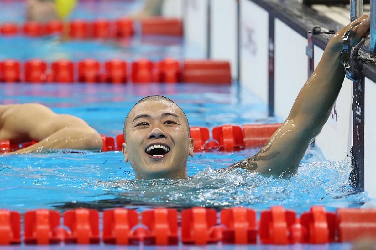 Pan Shiyun of China celebrates winning the gold medal