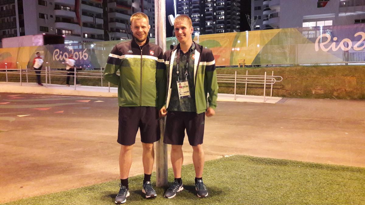 Genrik Pavliukianec with teammate Mindaugas Suchovejus at the Athletes' Village during the Rio 2016 Paralympics.